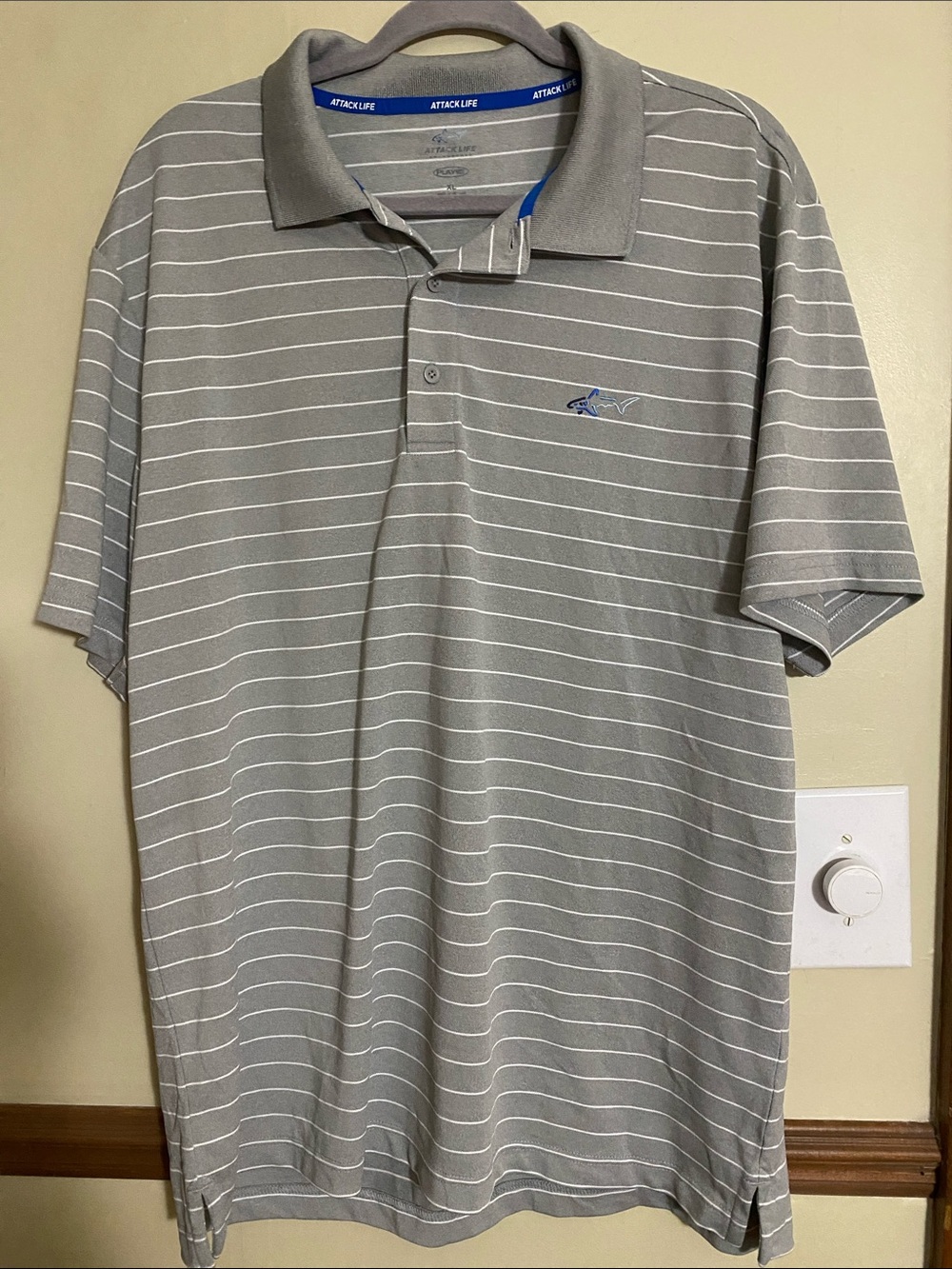 Attack Life by Greg Norman Gray Striped Polo with Blue Logo
